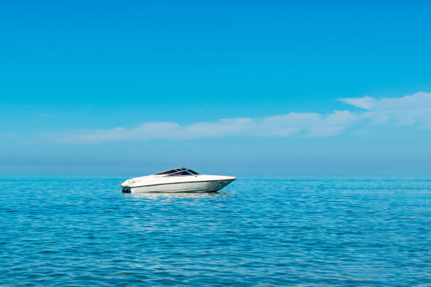 istock white motor boat at sea. place for text 2032833496