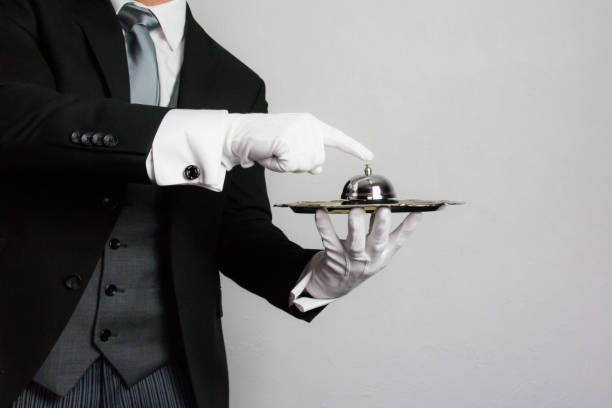 istock Butler or Hotel Concierge with Bell 2032865746