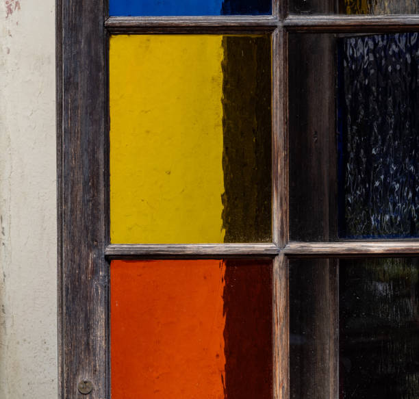 istock Multicolored  glasses of the window 2032954254