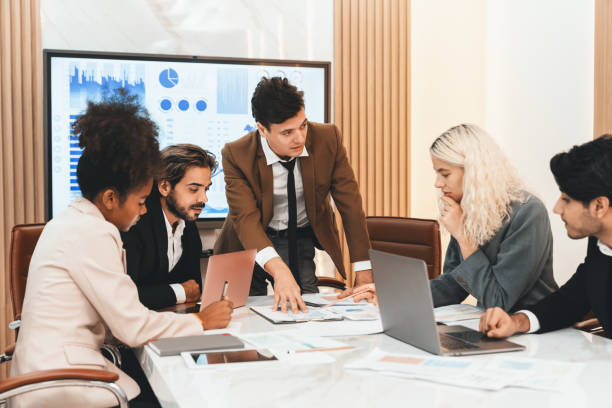 istock Professional smart business team discussion about start up project. Ornamented. 2032955517