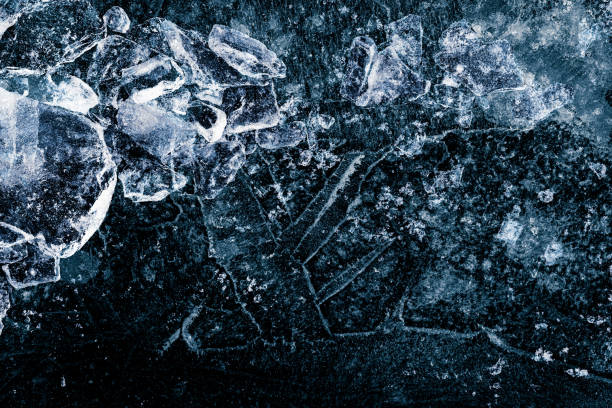 istock A crushed ice pieces on a dark ice background. 2032957123