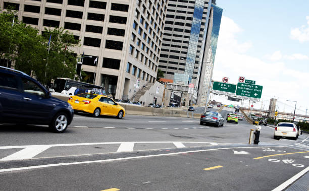 Traffic on urban road Lower Manhattan NY.