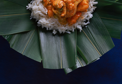 Chicken Curry with Basmati Rice served on bamboo leaves