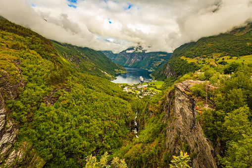 Fjord Geirangerfjord with cruise ship, view from Flydalsjuvet viewing point, Norway. Travel destination