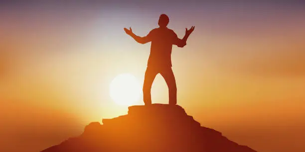 Vector illustration of Symbol of success with a man on top of a mountain.