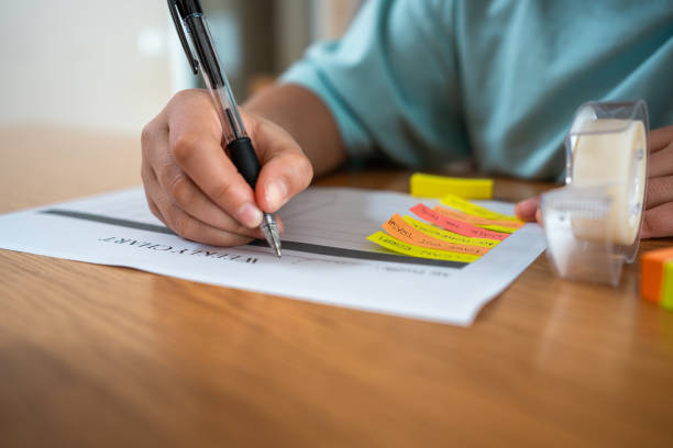 istock Mixed Race Girl Organizing School Project with Sticky Notes at Home 2033034947