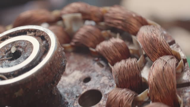 Closeup shot of copper windings in electric motors being repaired