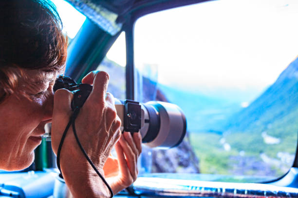 istock Photographer taking photo from camper car 2033050062