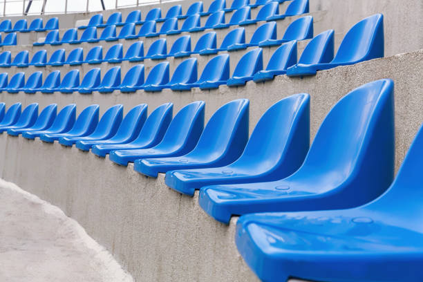 blue rows of seats on the stadium background.