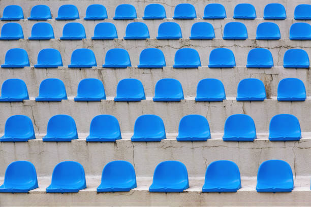 istock Plastic blue seats rows on street auditorium or stadium. No people 2033119390