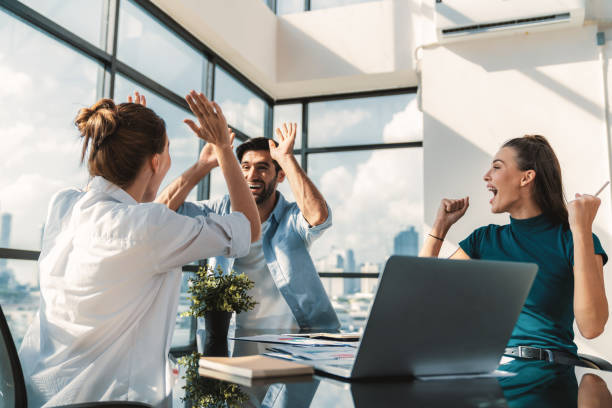 istock Group of happy businesspeople celebrate their successful project. Tracery. 2033126830