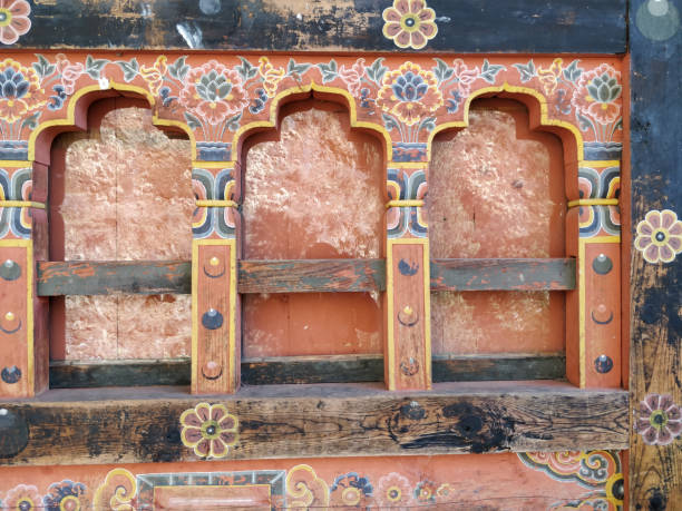 istock Traditional Bhutanese windows with intricate patterns on a decorated wall, bhutan. 2033127431