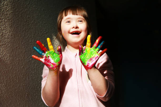 istock Cute little girl with painted hands 2033140058
