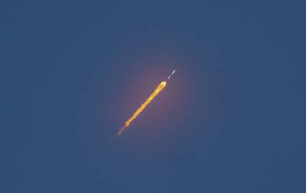 istock Cape Canaveral Rocket Launch over Florida Beach separating stages 2033145981