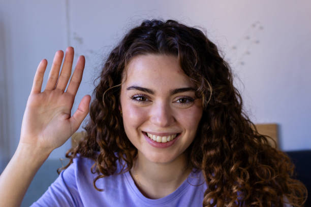 istock Friendly Fashion Blogger Waving Hello 2033188850