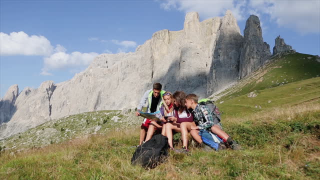 Adventures on the Dolomites: teenagers hiking