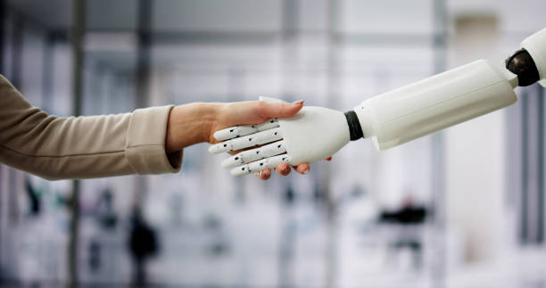 istock AI Robot And Human Woman Hand 2033305973