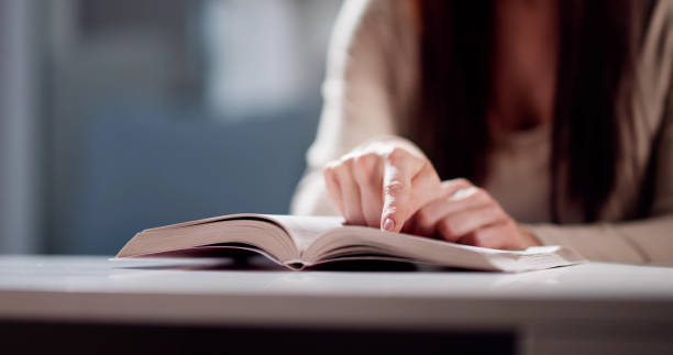 istock Prayer Woman Studying Bible Book 2033306526