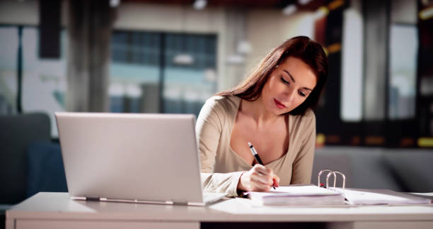 istock Women Calculating Finance Online On Couch 2033307606