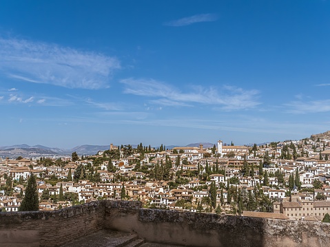 Panoramic view of the Albaicin district in Granada, Andalusia, Spain, historical old town, white houses, summer tourism vacation