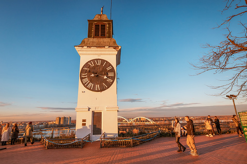 04 January 2024, Novi Sad, Serbia: historic clock tower of Petrovaradin Fortress, serving as a symbol of the city's rich heritage and offering visitors a scenic panorama of the Danube.