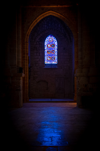 Vertical shoot of one window of the church of the Fontfroide Abbey in France. Photo taken inside with no people