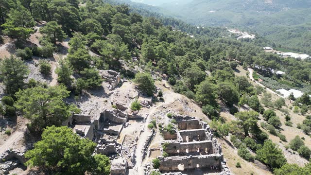 Aerial view of ancient theater in Arycanda Ancient City in Finike, Antalya. 4k resolution.