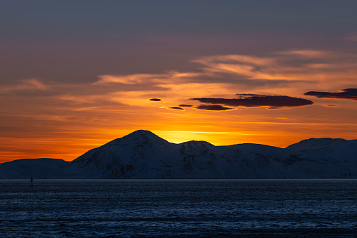Winter landscape silhouette at sunset.\nHammerfest - Norway.