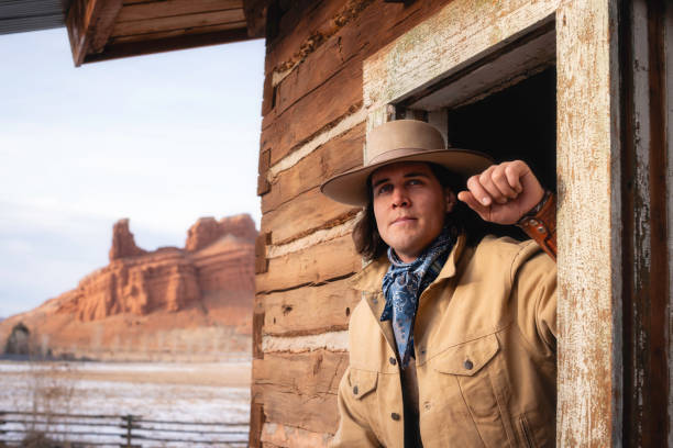 Ranch worker portrait at a Wyoming horse ranch in the winter in a rural landscape.
