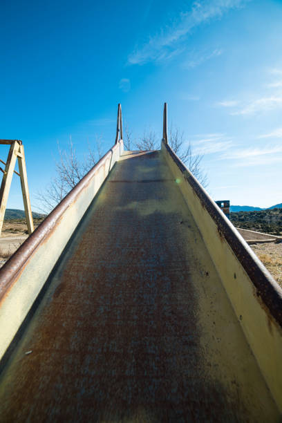 istock Rusty and abandoned slide in a village 2033745619