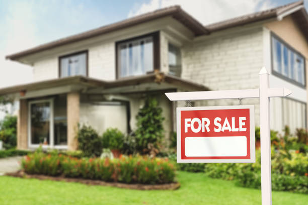 Real Estate Sign in Front of a House with a Garden for Sale 3d Render Real Estate Sign in Front of a House with a Garden for Sale houses for sale stock pictures, royalty-free photos & images