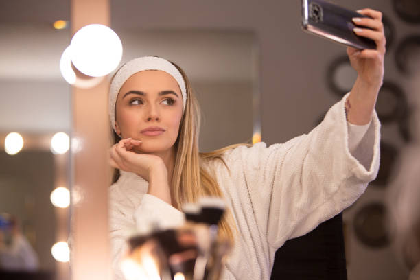 Selfie Confidence: Woman Captures Finished Makeup Look