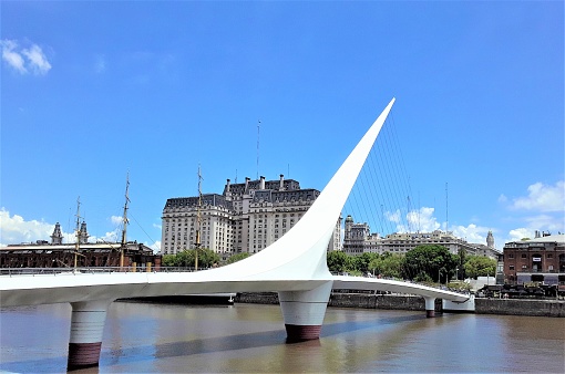 Buenos Aires, Argentina . 01/10/2024 Cityscape of Puerto Madero . The Woman´s Bridge (Puente de la Mujer) designed by the Spanish architect Santiago Calatrava.