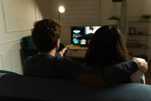 istock Boyriend and girlfriend watching a movie on a streaming service 2033915066