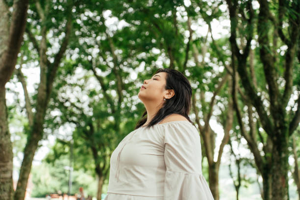 istock Asian woman contemplating nature 2034010395