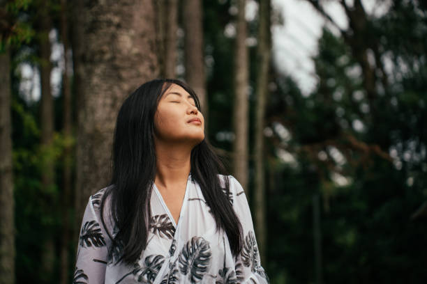 istock Asian woman contemplating nature 2034015384