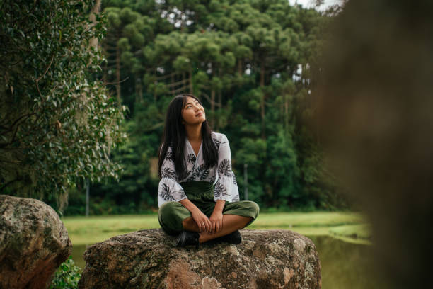 istock Asian woman contemplating nature 2034017424