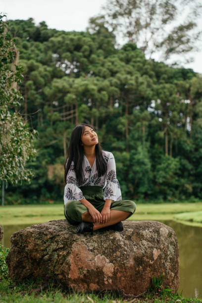 istock Asian woman contemplating nature 2034017425