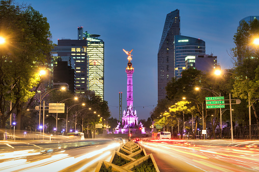 Angel of Independence on Paseo de la Reforma avenue in downtown Mexico City at night.