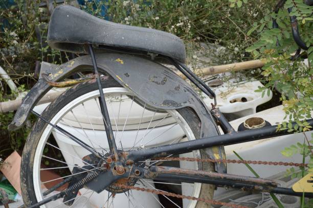 istock dirty abandoned bicycle in garden 2034036882