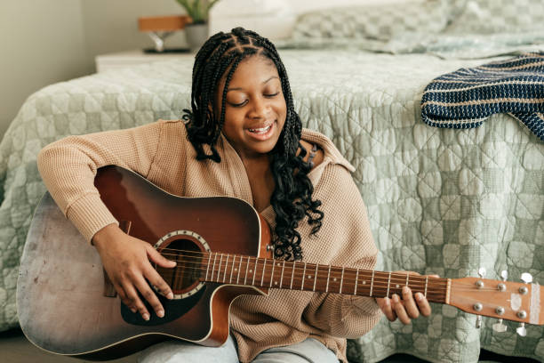 istock A Teen's Strum of Independence: Crafting Identity with Guitar Strings at Home