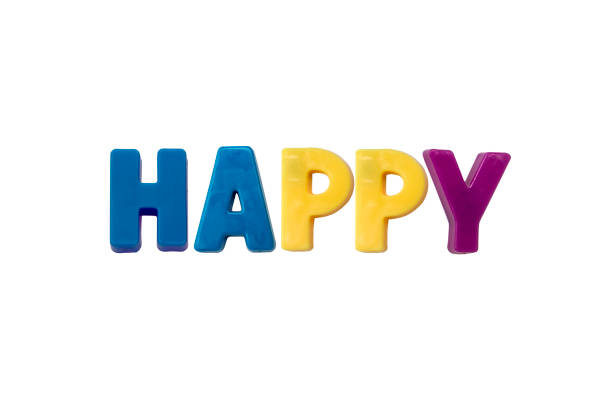 Happy written with letter magnets isolated on white