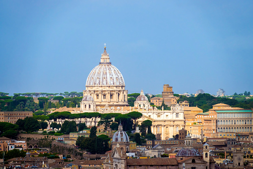 Vatican City, Vatican City State - August 21, 2008: St. Peter's Basilica at sunset from Via della Conciliazione. Vatican City State. Rome, Italy.