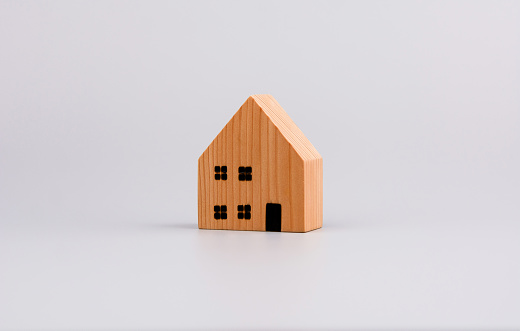 Model wooden house, toy house, first house project and home loan and housing