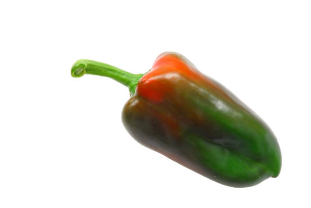 Fresh picked green and red pepper isolated on white background