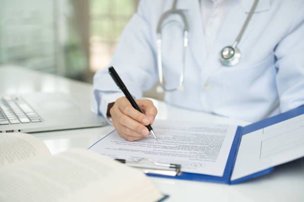 istock medical writer or medical communicator are writing clinical trial documents that describe research results, product use, and other medical information. 2034483072