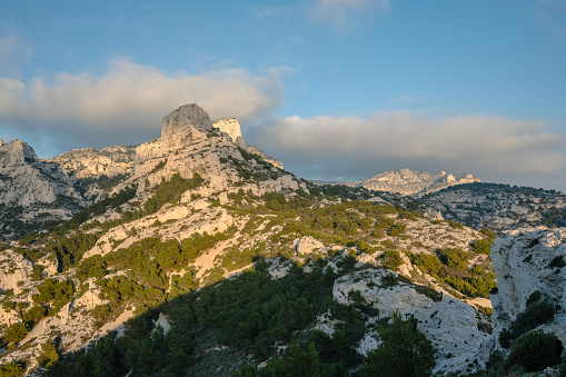 Panorama, landscape of the cliffs  of the Callelongue Calanque. Marseille, PACA, France. Evening light. Blue sky, clouds. HD.