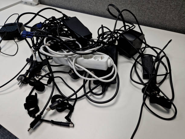 istock plastic flexible tunnel for cables from the floor socket connected by one transparent pipe and there is no danger of tangling data and power cables and the transformer for the computer led monitor 2034681554