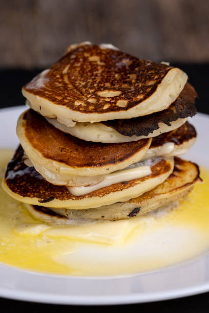 istock delicious cooked pancakes with cottage cheese and melted butter 2034689590