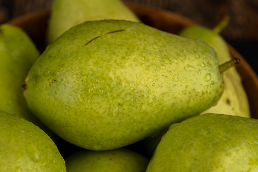 whole ripe and juicy green pears, delicious pears washed and ready for eating